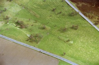 Aerial view of Chapelton hut circles, W of Boat of Garten, Speyside, looking SE.