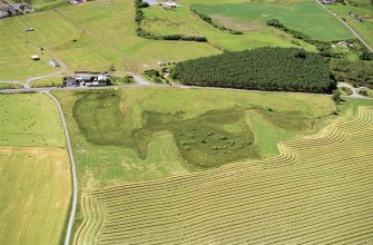 Aerial view of Gilchrist, Muir of Ord, Easter Ross, looking NE.