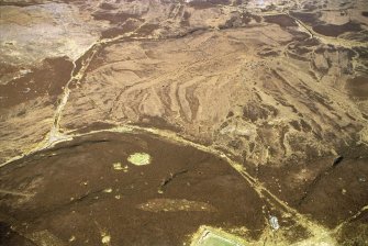 Aerial view of hut circles at Cnoc-an-t-sidhein, Rogart, Sutherland, looking NE.