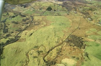 Oblique aerial view of settlement at Little Rogart, Sutherland, looking NW.