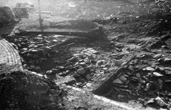 Excavation photograph : 006, lower stones after machine trample removed.