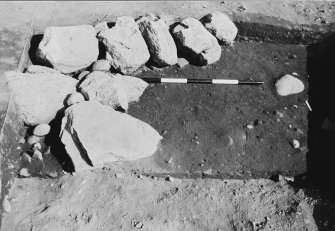 Excavation photograph : trench IIIa - feature CAA, cutting 2 and rocks CDD.
