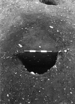 Excavation photograph : half section of feature.
