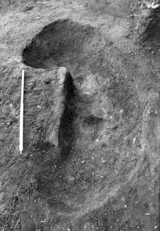 Excavation photograph : feature f702 almost completely excavated, from S.