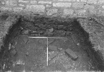 Excavation photograph : trial trench 4 - rubble, from N.