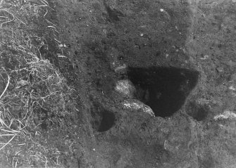 Excavation photograph.  F653 and 654, from north.