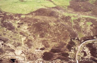 An oblique aerial view of the former township of Dola, Lairg, Sutherland, looking S.