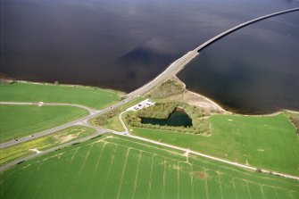 Aerial view of South side of the Cromarty Bridge, looking over the Cromarty Firth, looking W.