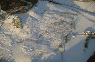 Near overhead aerial view of Thor's Field, Torboll Farm, Strath Fleet, East Sutherland, looking N.