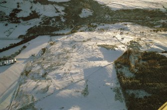 Oblique aerial view of Torboll Farm, Strath Fleet, East Sutherland, looking S.