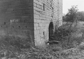 Excavation archive: West side of tower, from NW.