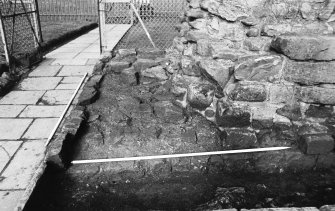 Excavation photograph : the modern path leading into the castle courtyard, through the north curtain wall.