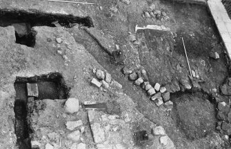 Excavation photograph : gatehouse area after partial removal of 1968 backfill, from south-west.