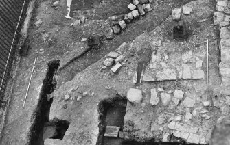 Excavation photograph : west end of gatehouse area after partial removal of 1968 backfill, from west.