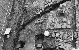 Excavation photograph : west end of gatehouse tower after removal of 1968 backfill and robbing debris.