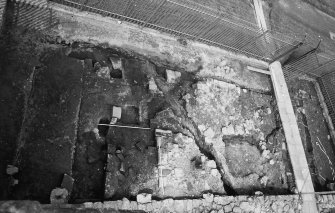 Excavation photograph : gatehouse tower showing main structural elements, from south..