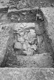 Excavation photograph : trench A, corner of building, from E.
(B&W negatives colour printed)