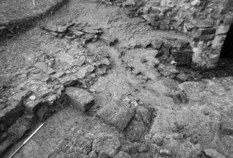 Excavation photograph : centre of trench A, from NW.
(B&W negatives colour printed)