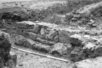 Excavation photograph : trench A, elevation of wall.
(B&W negatives colour printed)
