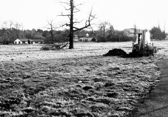 Watching brief photograph : area to E of castle being stripped of topsoil.