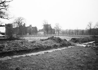 Watching brief photograph : area to E of castle being stripped of topsoil.