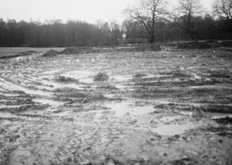 Watching brief photograph : area to E of castle after topsoil removed.