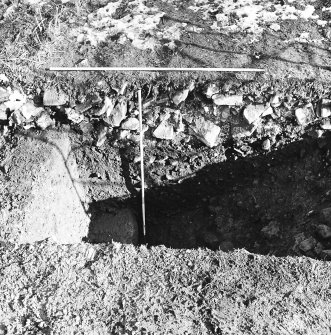 Roberton, motte: excavation photograph of ditch (S side of storm drain) from W
C Tabraham, 1979