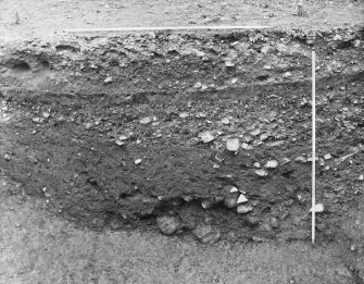 Excavation photograph - ditch, counterscarp on right.