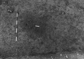 Excavation photograph : area 3 - f3033, pit pre ex and possible stakeholes, from S.