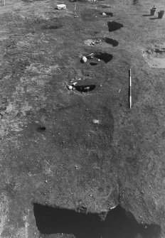 Excavation photograph : area 3 - f3032, 3035, 3036, features during excavation, from W.
