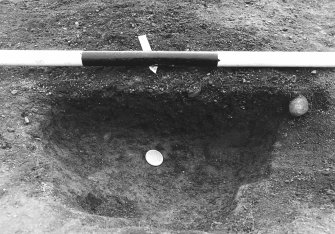 Excavation photograph : area 4D - f4018, half section, from W.