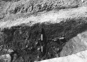 Excavation photograph : area 4K - f4010, N baulk of trench section, from S.