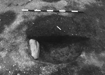 Excavation photograph : area 4 - f4093, half section, from S.