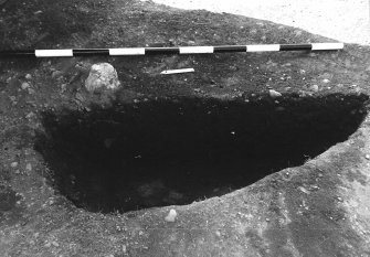 Excavation photograph : area 4A - f4110 - half section, from E.