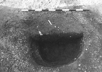 Excavation photograph : area 4A - f4083, half section, from S.