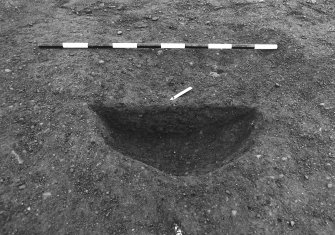 Excavation photograph : area 4A - f4097, half section, from S.