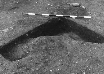 Excavation photograph : area 4A - f4099/4100, 4011, general shot, NE quad removed, from NE.