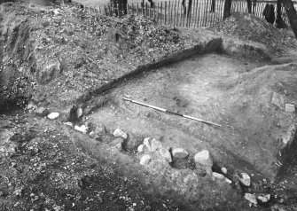Excavation photograph. Western side of entrance, showing end of rampart and line of post-holes on inner side. Publication plate XIV, PSAS LXXXV (1950-1).
Original negative deteriorating and copy negative made 1995.
Accessed 8 February 1994