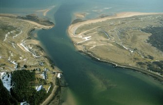 Oblique aerial view of Littleferry, Sutherland, looking E.