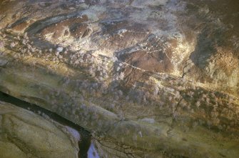 Aerial view of roundhouse, Storal, Strath Brora, East Sutherland, looking SE.