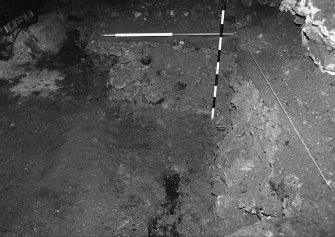 Excavation photograph : area A - east facing section in east part of room, north excavated part.