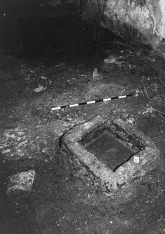 Excavation photograph showing area G at Edinburgh Castle with brick feature 106 with steps in background