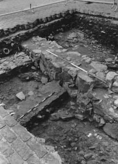 Excavation photograph : area N - baulk of 937 left on top of 943? on S half of trench, slope 959 to E.