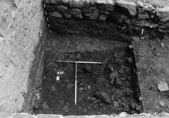 Excavation photograph : area N - working shot of rubble in/under 971.