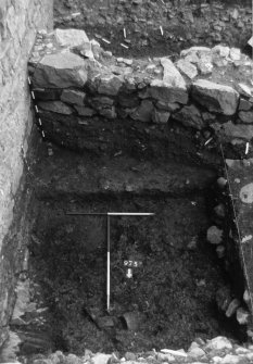 Excavation photograph : area N - straight sided and flat bottomed clay cut ditch.