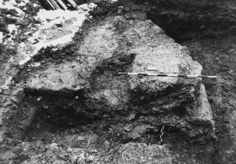 Excavation photograph : area M - further excavated slot, cut by pipe trench to N.