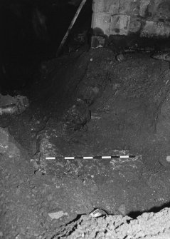 Excavation photograph : area L - Inner barrier wall seen in pipe trench.