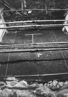 Excavation photograph: area X - medieval midden surface (?) after cleaning 17th and 18th century rubble.