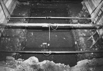 Excavation photograph: area X - linear stone feature - drain?