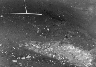 Excavation photograph: area X/H - general of E and W sides of trench.